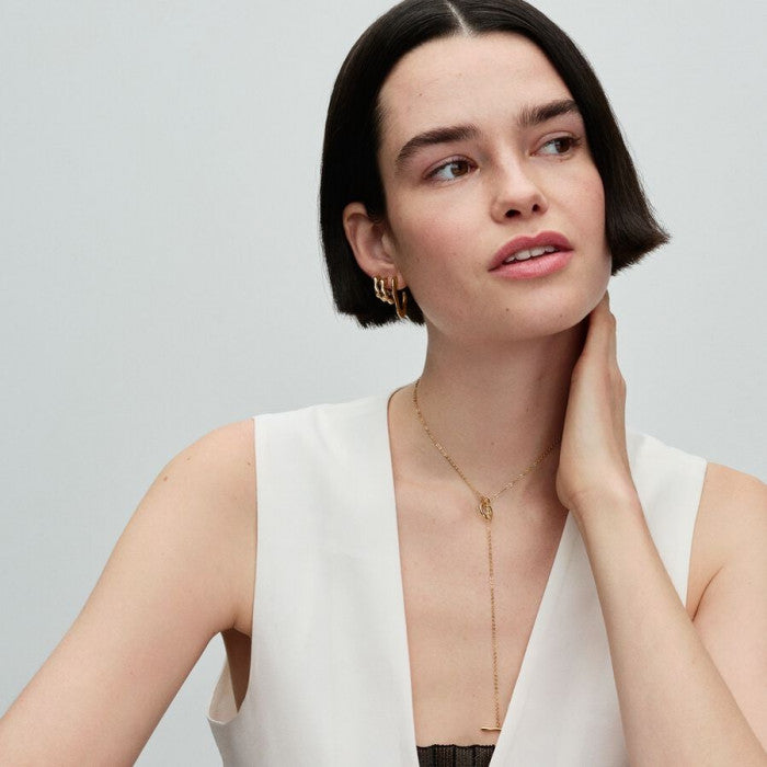 Orecchini Cerchi a V Aperti Linea Sinuosa