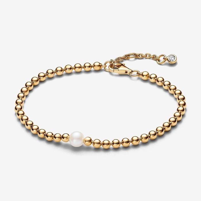 Bracelet avec perle de culture d'eau douce et sphères