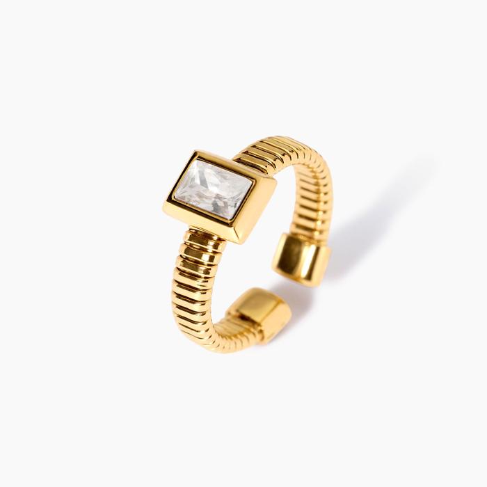 Anello tubogas dorato con zirconi