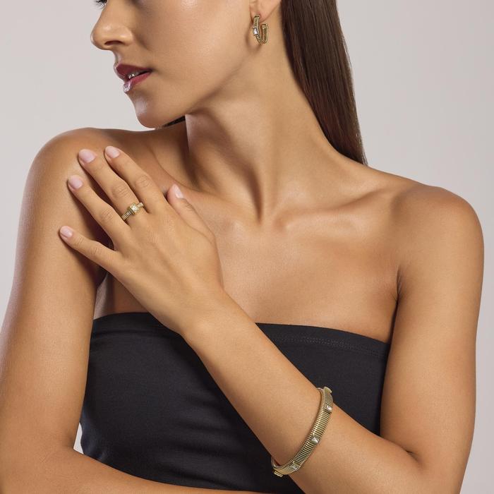 Anello tubogas dorato con zirconi