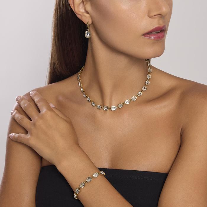 Bracciale dorato con cristalli bianchi