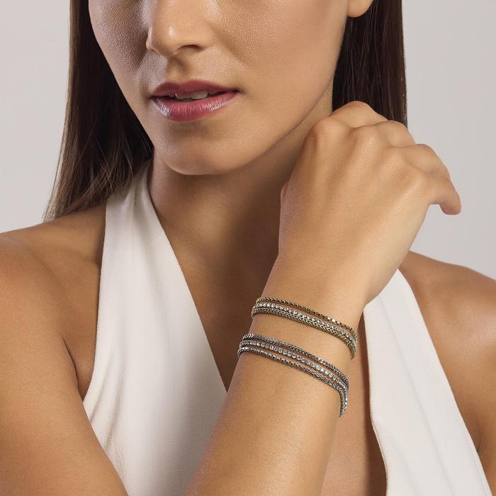 Bracciale dorato con due catene e tennis