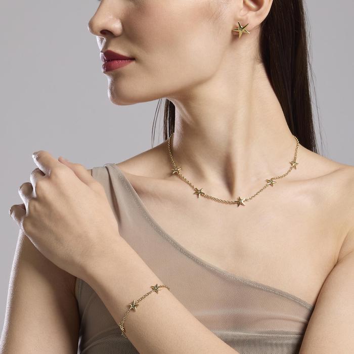 Bracciale dorato con ciondoli stella marina