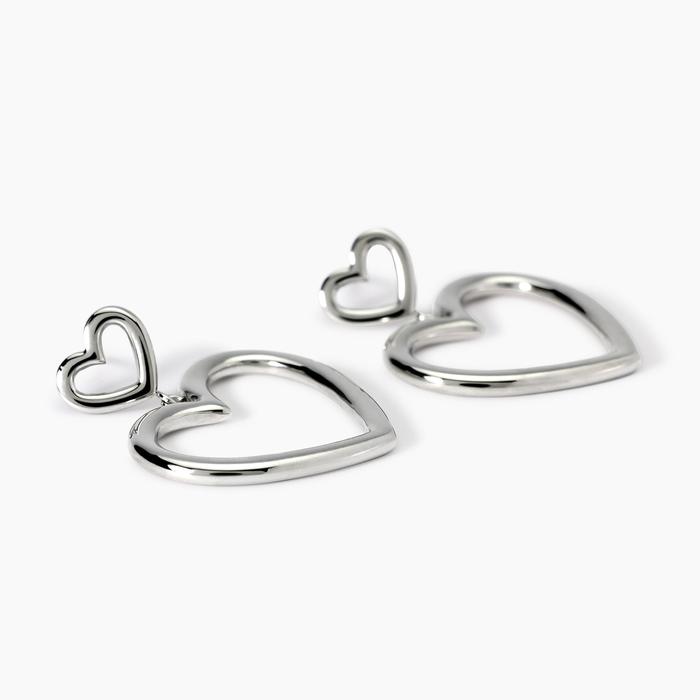 Boucles d'oreilles en acier avec coeurs