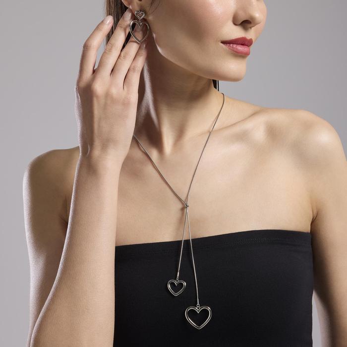 Boucles d'oreilles en acier avec coeurs