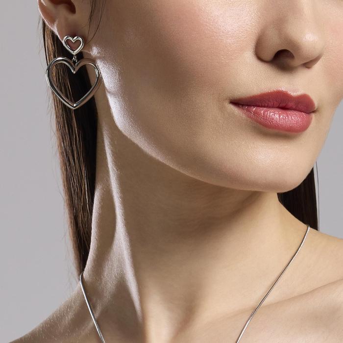 Boucles d'oreilles en acier avec coeurs