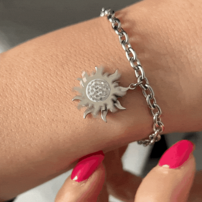 WOMEN'S BRACELET IN STEEL WITH ROTATING SUN