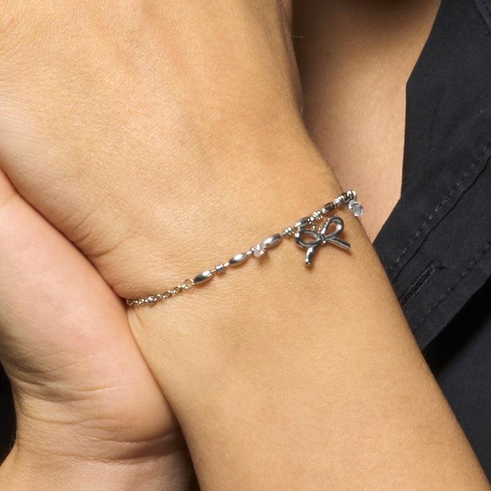 BRACCIALE DONNA IN ACCIAIO CON FIOCCO E ZIRCONI BIANCHI