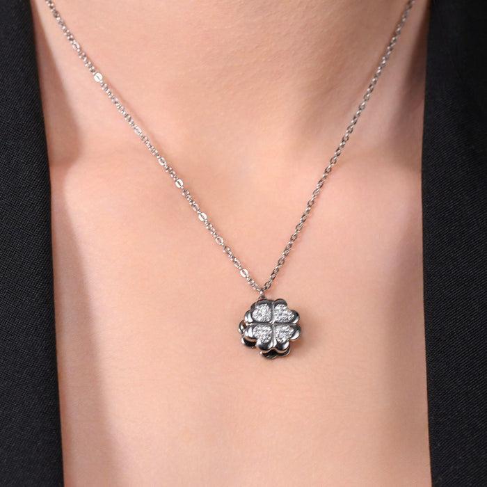 COLLIER EN ACIER POUR FEMME AVEC TRÈFLE À QUATRE FEUILLES TOURNANT