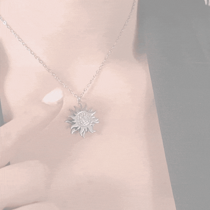 WOMEN'S STEEL NECKLACE WITH ROTATING SUN