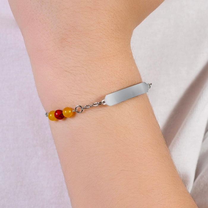 CHILDREN'S BRACELET IN STEEL WITH YELLOW AND RED STONES