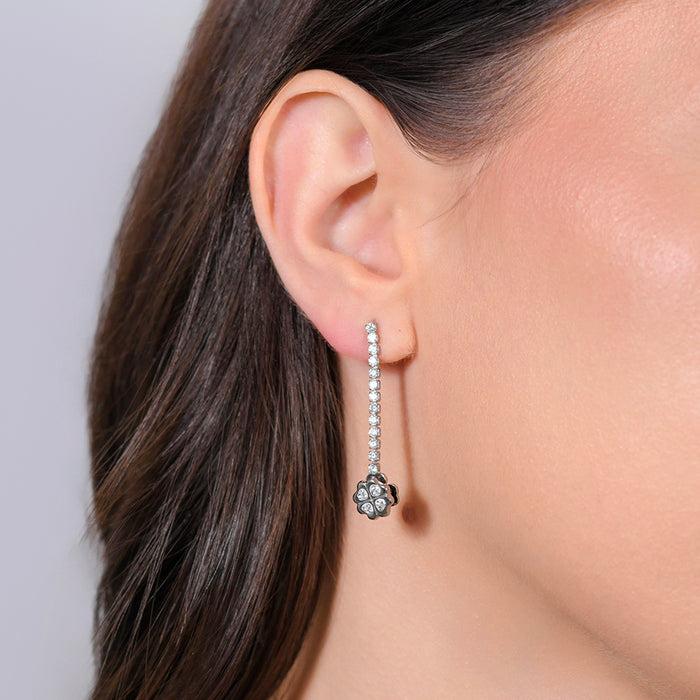 BOUCLES D'OREILLES TENNIS EN ACIER POUR FEMME AVEC TRÈFLE À QUATRE FEUILLES TOURNANT