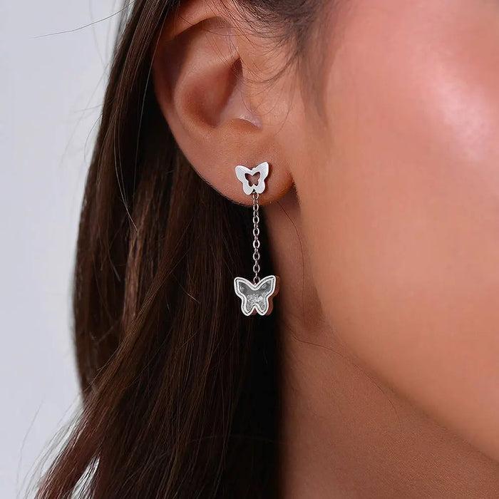 BOUCLES D'OREILLES FEMME EN ACIER AVEC PAPILLONS ET ZIRCONE