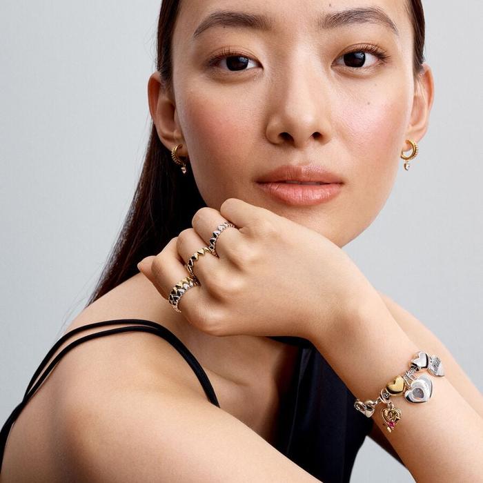 Boucles d'oreilles créoles avec cœur suspendu