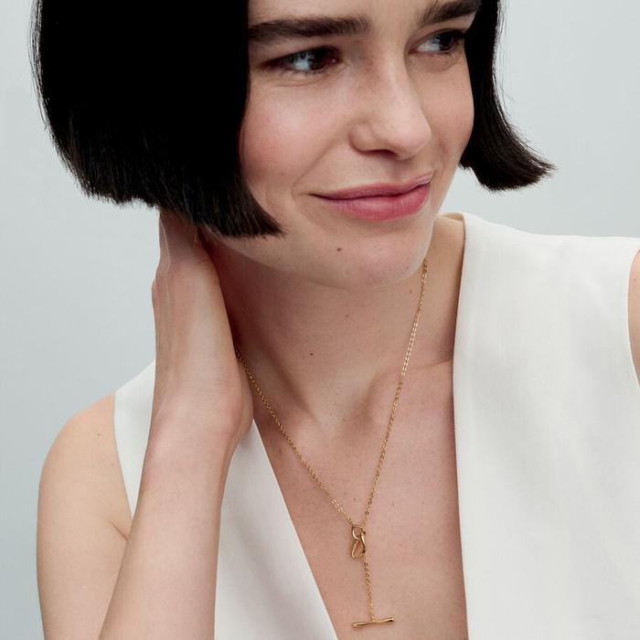 Collier à fermeture en T avec ligne sinueuse