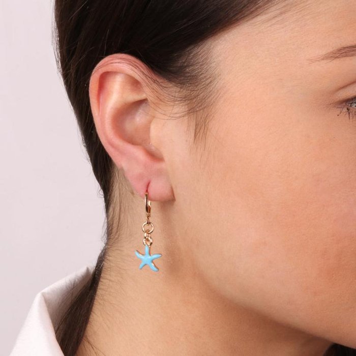 Metal earrings with starfish