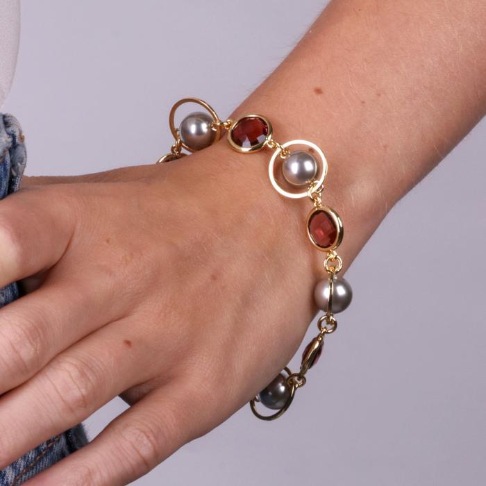Bracelet en métal avec cristaux marron, cercles et perles