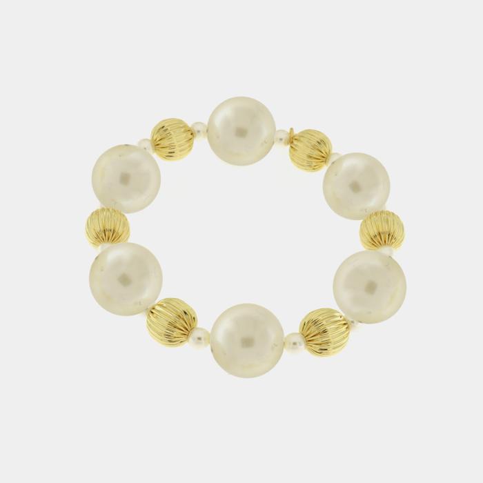 Metal bracelet with pearls and gold details