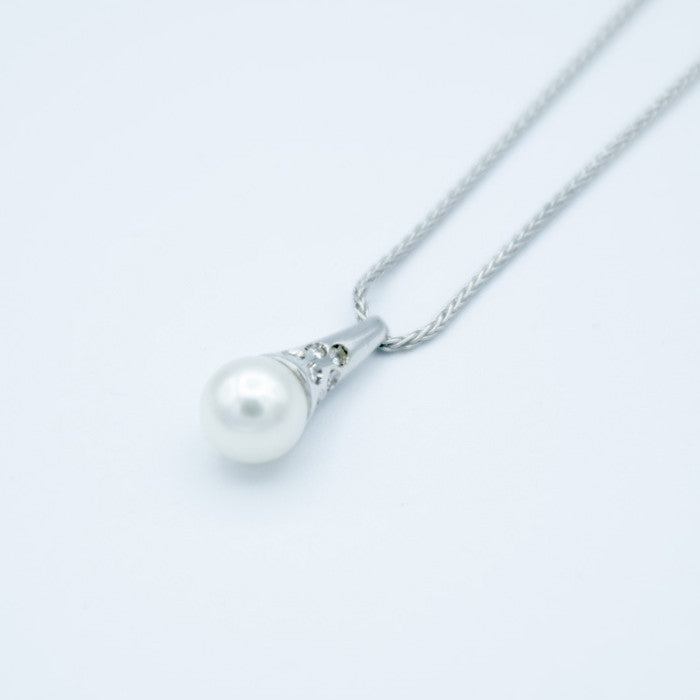 Collier ras du cou avec perles et bracelet DAMIANI
