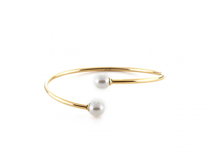 Rigid bracelet with laminated pearls