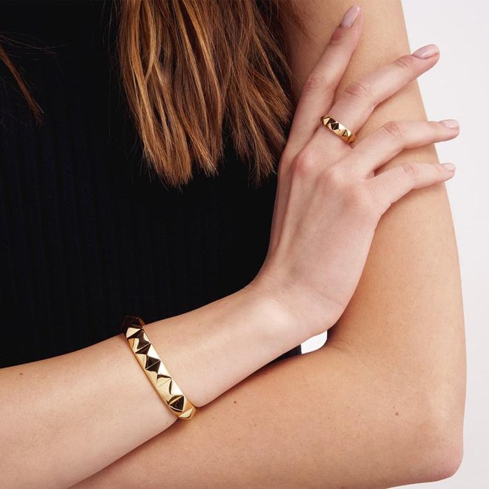 Rigid bracelet in gilded bronze