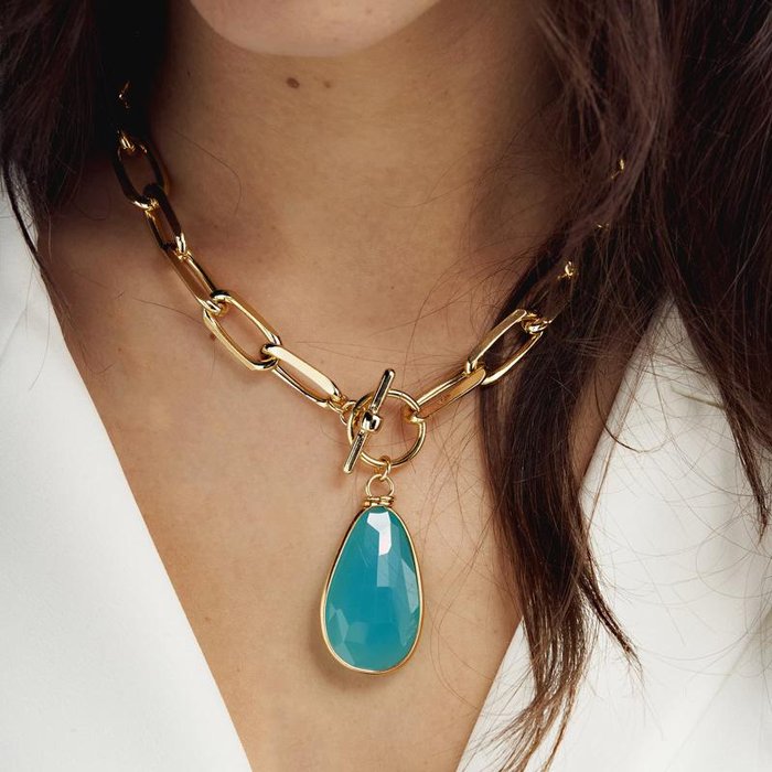 Gold plated bronze necklace with turquoise crystal