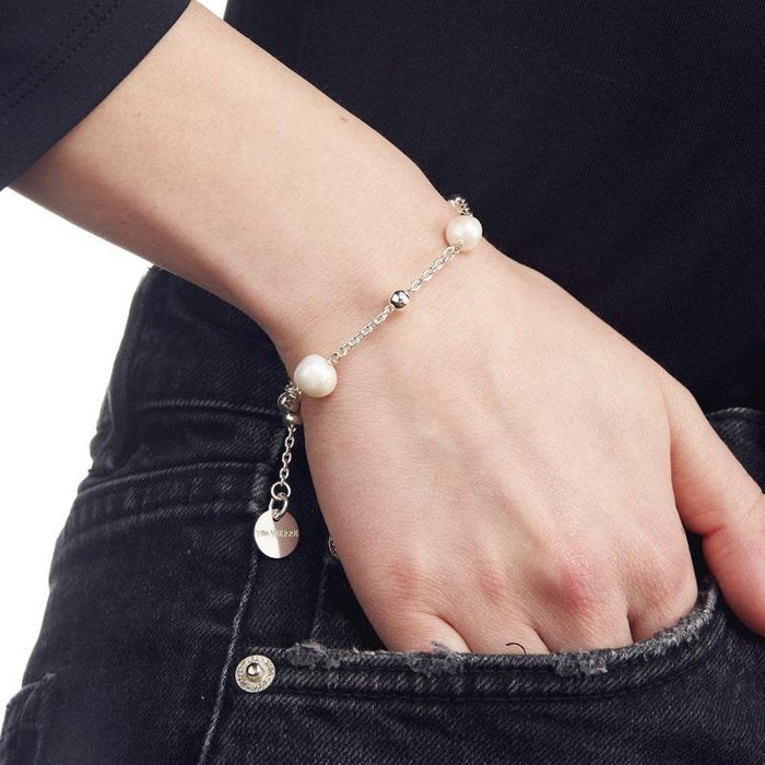 Chain bracelet with natural pearls
