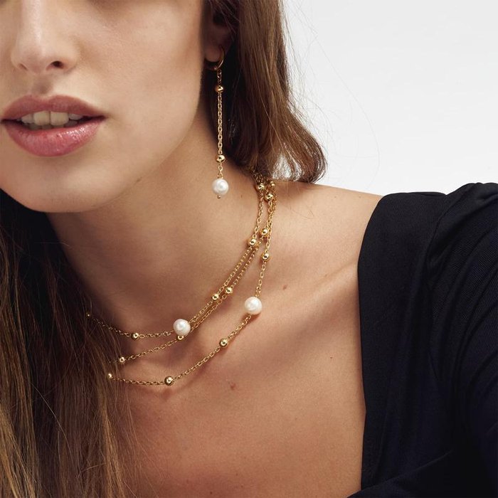 Collier en bronze doré et perles naturelles