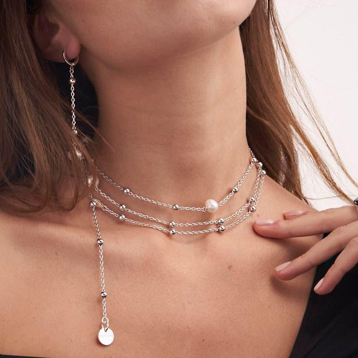 Chain and natural pearl necklace