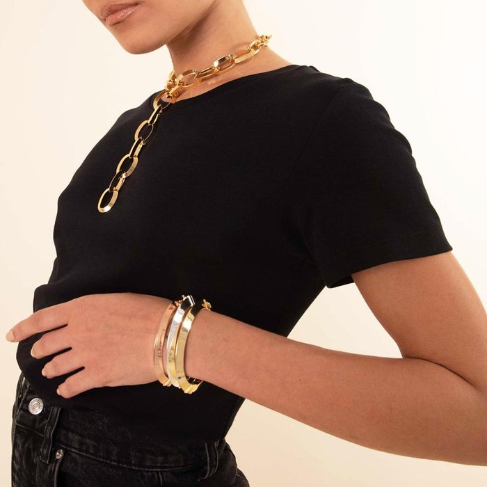 Rigid bracelet with triangular tube