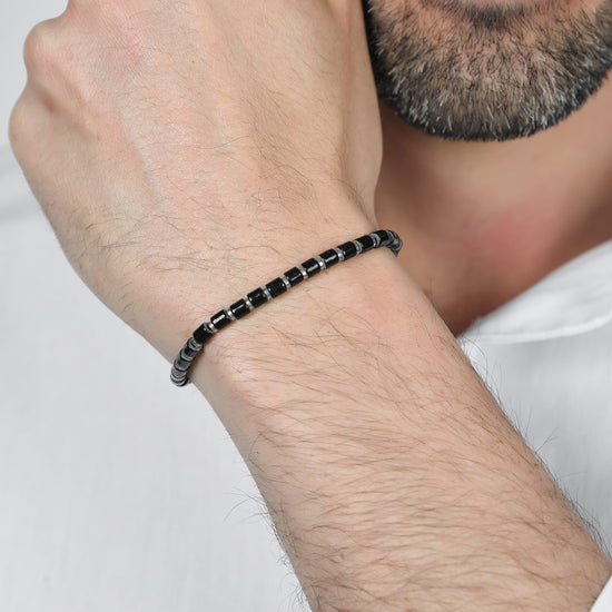 BRACCIALE UOMO IN ACCIAIO CON PIETRE NERE