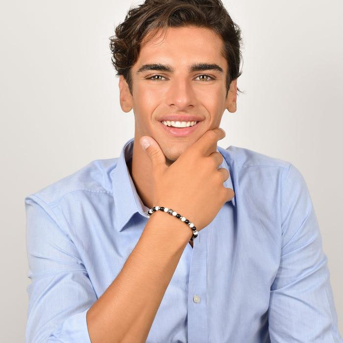 BRACCIALE UOMO ELASTICO CON PIETRE NERE E BIANCHE ED ELEMENTI IN ACCIAIO