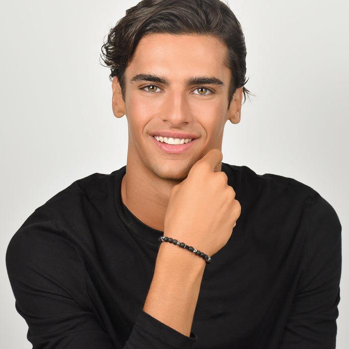 BRACCIALE UOMO IN ACCIAIO CON PIETRE NERE ED ELEMENTI IN ACCIAIO
