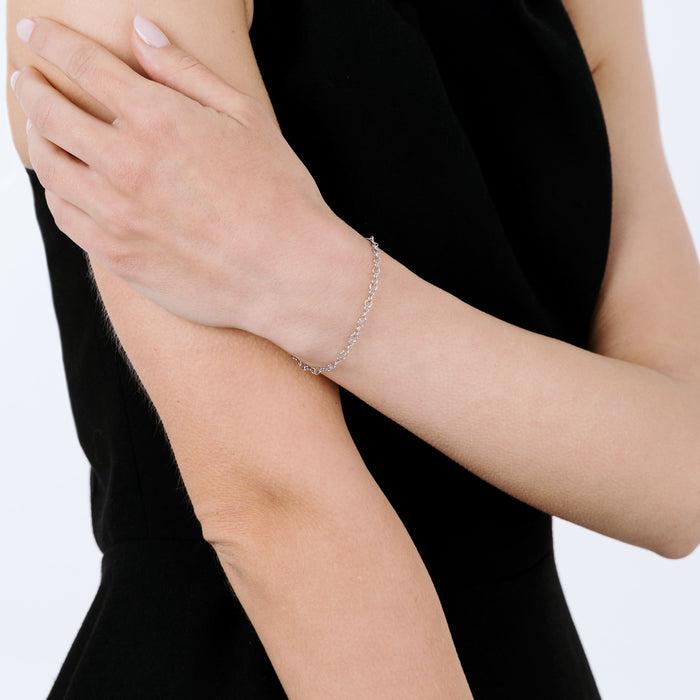 WOMEN'S STEEL BRACELET WITH SMALL CIRCLES