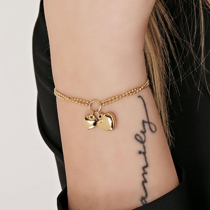 BRACCIALE DONNA IN ACCIAIO IP GOLD CON CUORI DI GRANDEZZE DIVERSE
