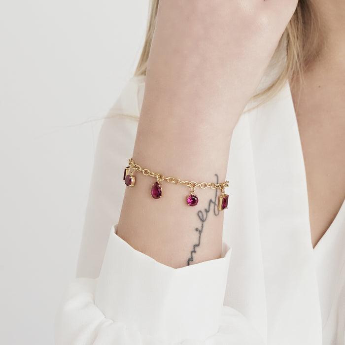 WOMEN'S BRACELET IN IP GOLD STEEL WITH FUCHSIA CRYSTALS
