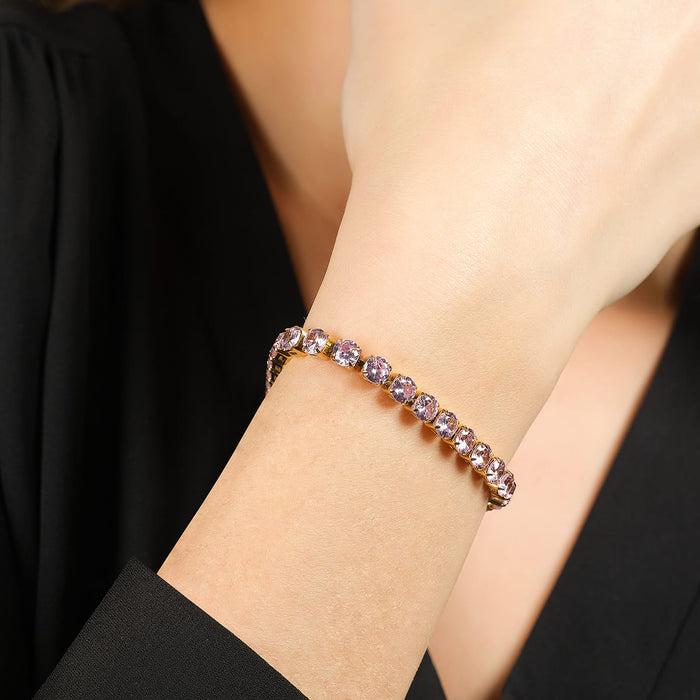 BRACCIALE TENNIS DONNA IN ACCIAIO IP GOLD CON CRISTALLI ROSA