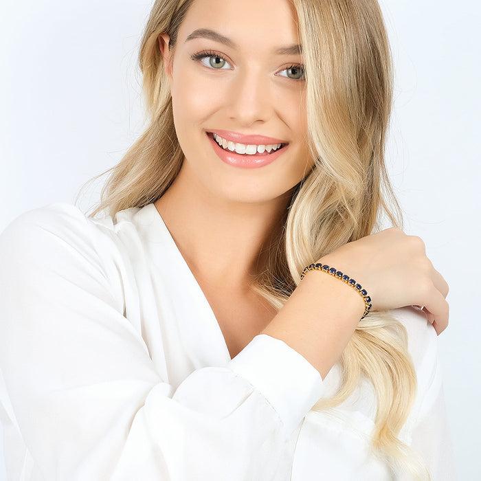 BRACCIALE TENNIS DONNA IN ACCIAIO IP GOLD CON CRISTALLI BLU