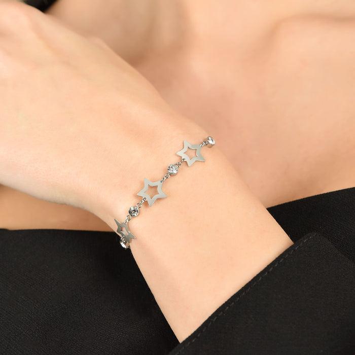 WOMEN'S STEEL BRACELET WITH PERFORATED STARS AND WHITE CRYSTALS