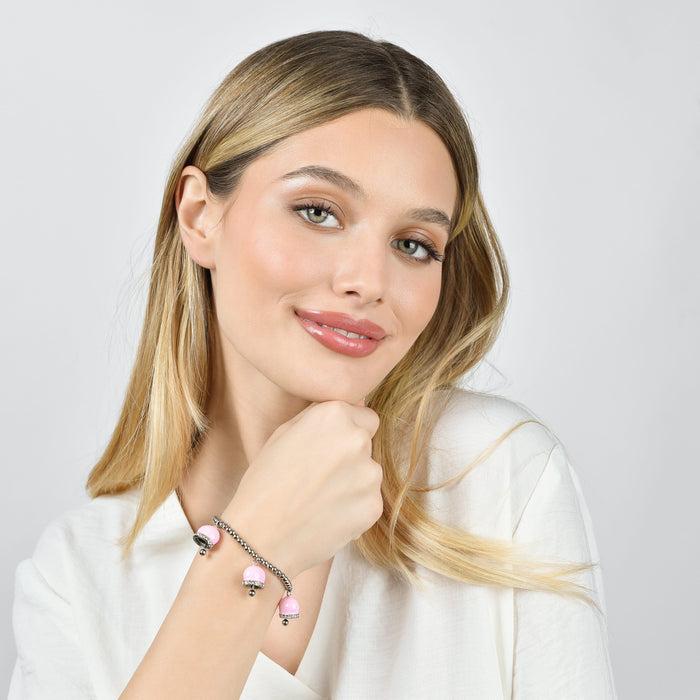 BRACCIALE DONNA IN ACCIAIO CON CAMPANELLE CON SMALTO ROSA E CRISTALLI BIANCHI