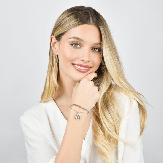 BRACCIALE DONNA IN ACCIAIO CON MONDO CON CRISTALLI BIANCHI