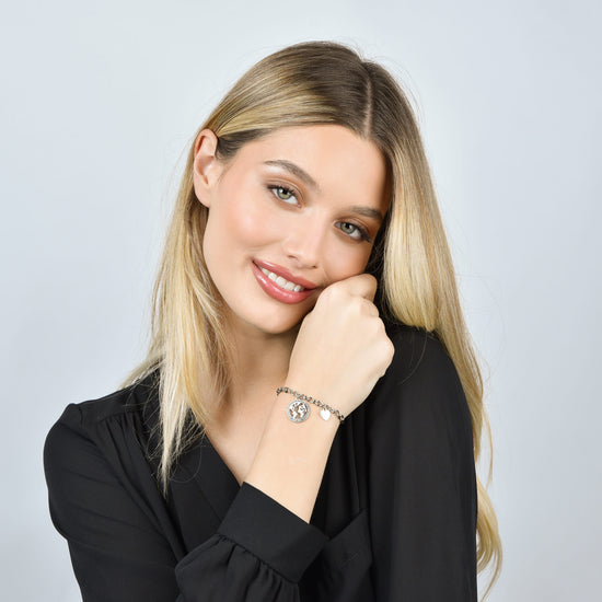 BRACCIALE DONNA IN ACCIAIO CON MONDO CON CRISTALLI BIANCHI