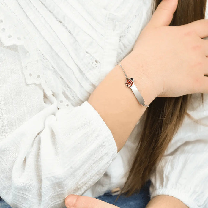 BRACCIALE BAMBINA PERSONALIZZABILE IN ACCIAIO CON COCCINELLA