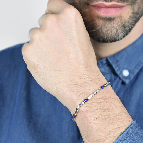 BRACCIALE UOMO IN ACCIAIO CON PIETRE BLU ED ELEMENTI IP GOLD