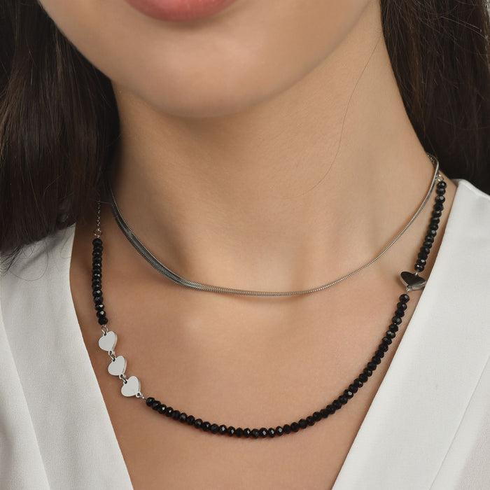 COLLIER FEMME MULTI-STRETS EN ACIER AVEC CRISTAUX NOIRS ET COEURS