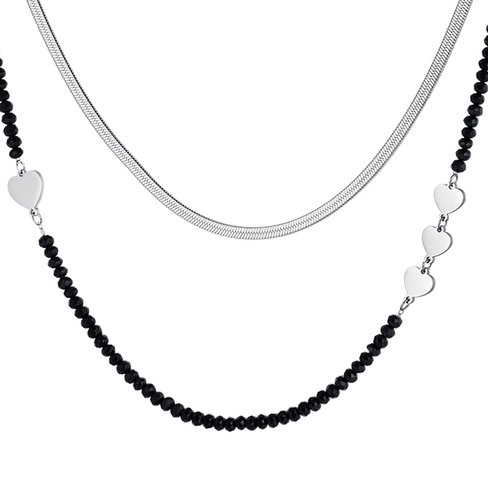 COLLIER FEMME MULTI-STRETS EN ACIER AVEC CRISTAUX NOIRS ET COEURS