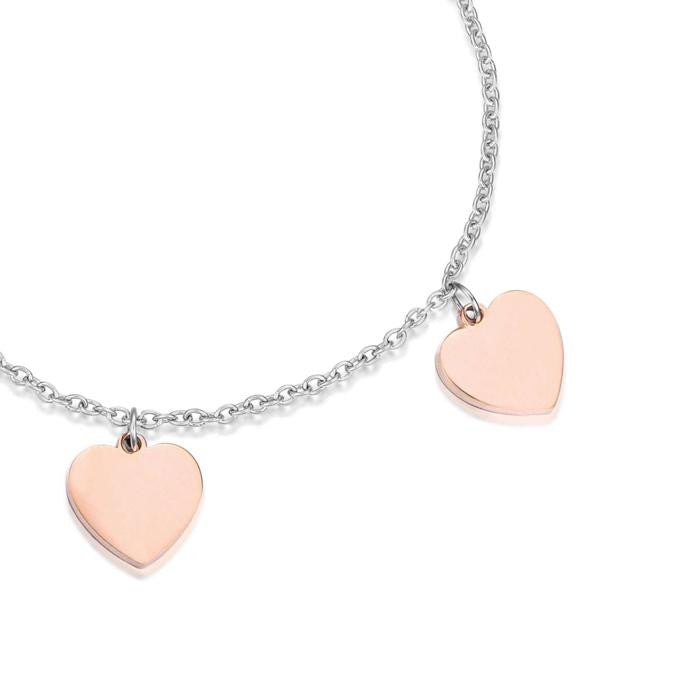 Bracelet en acier avec cœurs roses