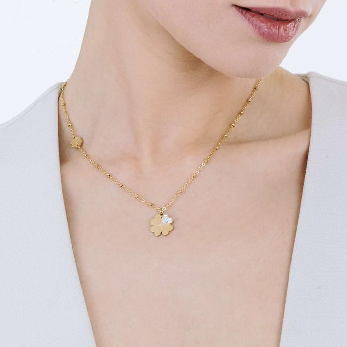 Collier en acier doré IP avec trèfles à quatre feuilles et cristaux blancs