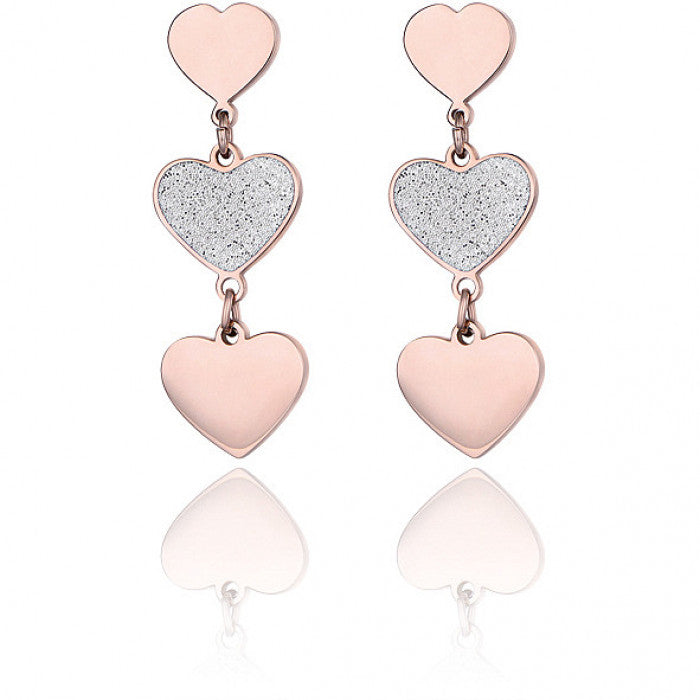 Boucles d'oreilles pendantes en forme de cœur pailleté
