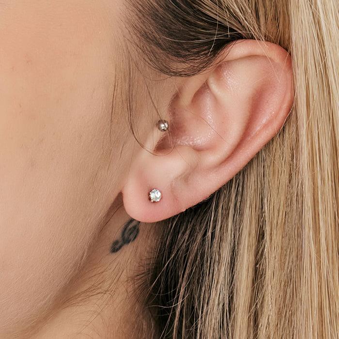 BOUCLE D'OREILLE UNIQUE POINT DE LUMIÈRE EN ACIER AVEC CRISTAL BLANC 3 MM